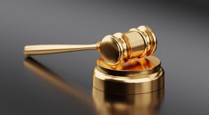 Peoria Assault Lawyer Canva Golden Hammer and Gavel 300x165
